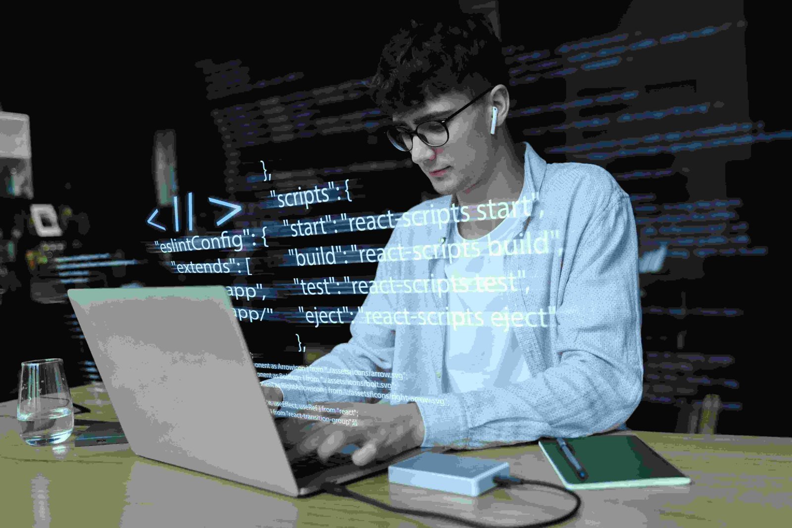 programming-background-with-person-working-with-codes-computer-1-1-scaled